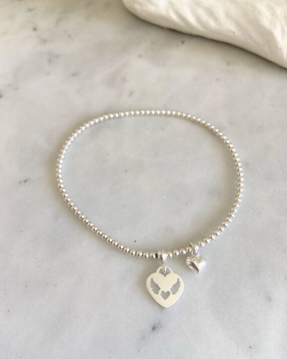 Pulsera elasticada medalla corazón alitas